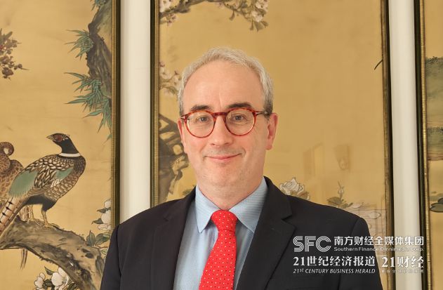 专访英国驻华贸易使节倪乐思：欢迎中国经济持续增长(图1)